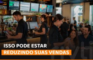 Equipe de atendimento utilizando sistema integrado de pedidos e pagamentos em um bar para agilizar o serviço, reduzir retrabalho e aumentar a eficiência operacional.
